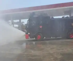 Brimob Kuala Semprotkan Desinfektan di Tempat Umum, Ini Tujuannya