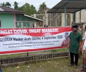 Desa Kuala Baru Sosialisasi Gerakan Masker Kepada Masyarakat