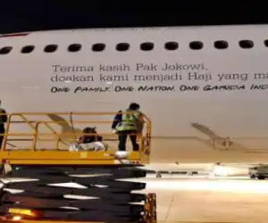 Ada Tulisan "Terima Kasih Pak Jokowi" Di Badan Pesawat Garuda, Diprotes Warganet